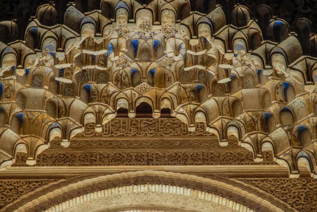 Painted stucco wall detail in Comares Palace, Alhambra Palace, Granada, Andalusia, Spain